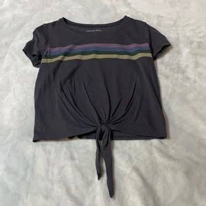 American Eagle dark grey top with a purple, blue, green, and yellow stripe.